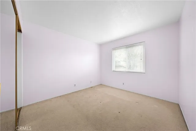 an empty room with a natural light