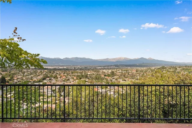 a backyard of a house with outdoor seating