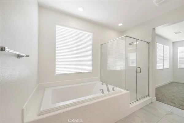 an empty room with closet and a sink