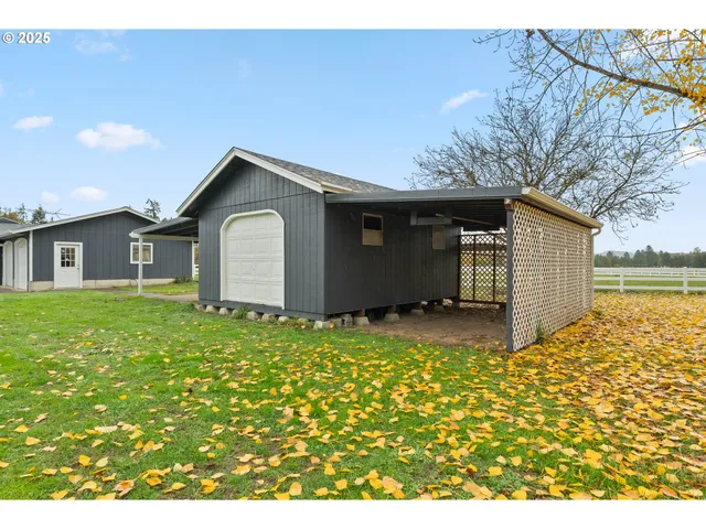 a view of a room with wooden walls and stairs