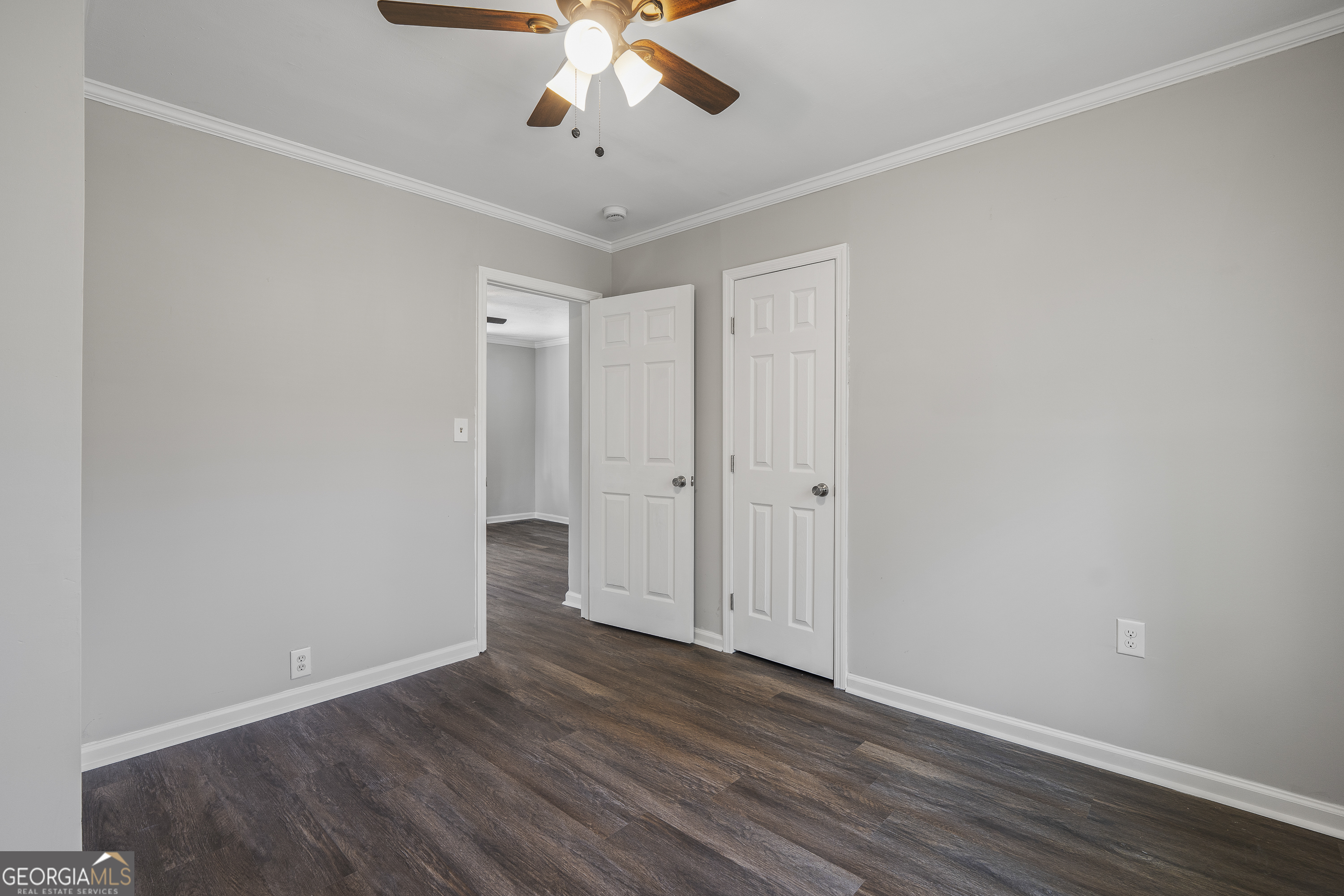 4622 Wilson Road Macon, GA 31206 - Photo 14 of 24 a view of an empty room with wooden floor