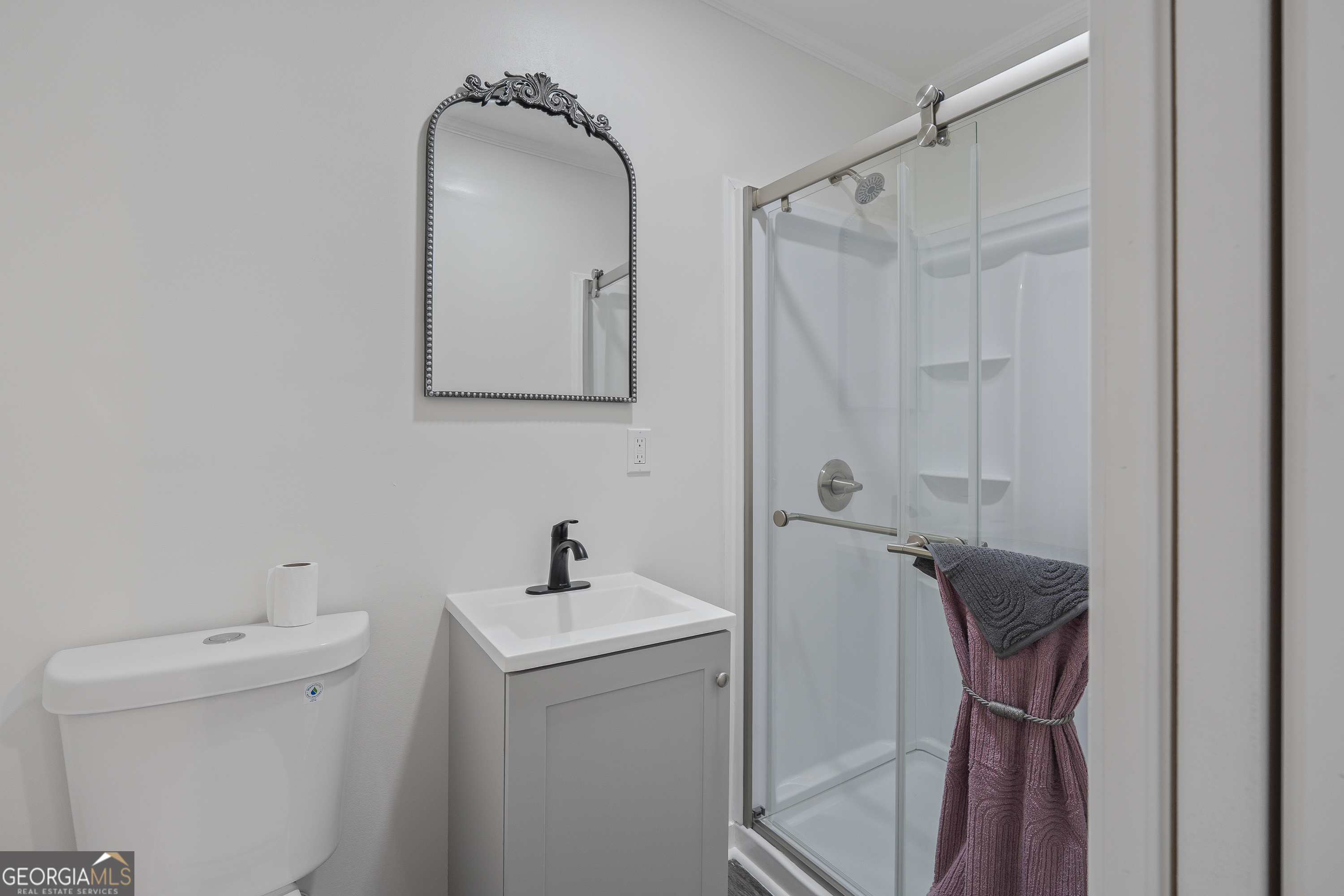 4622 Wilson Road Macon, GA 31206 - Photo 21 of 24 a bathroom with a sink a toilet and shower