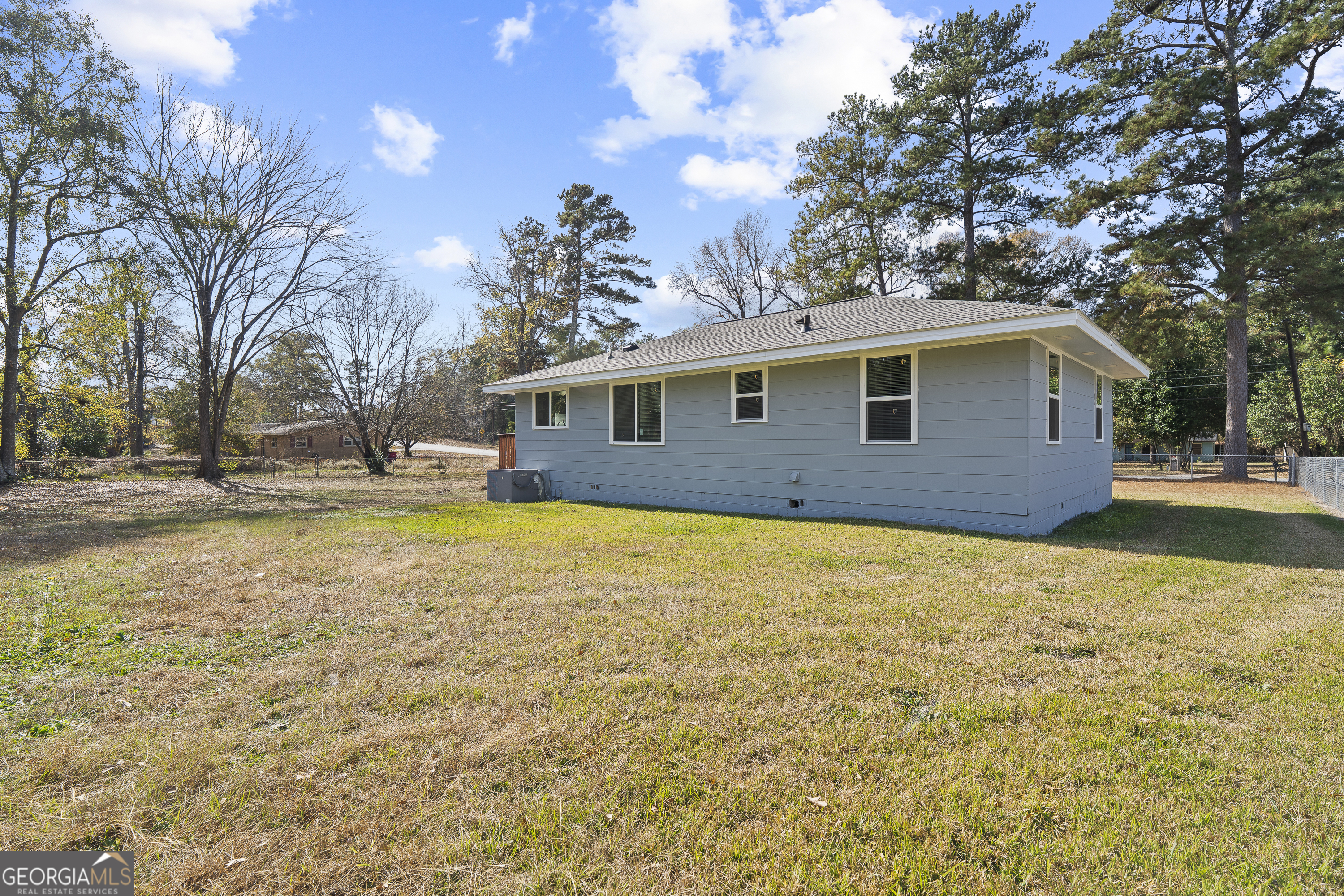 4622 Wilson Road Macon, GA 31206 - Photo 24 of 24 a view of a yard with a house