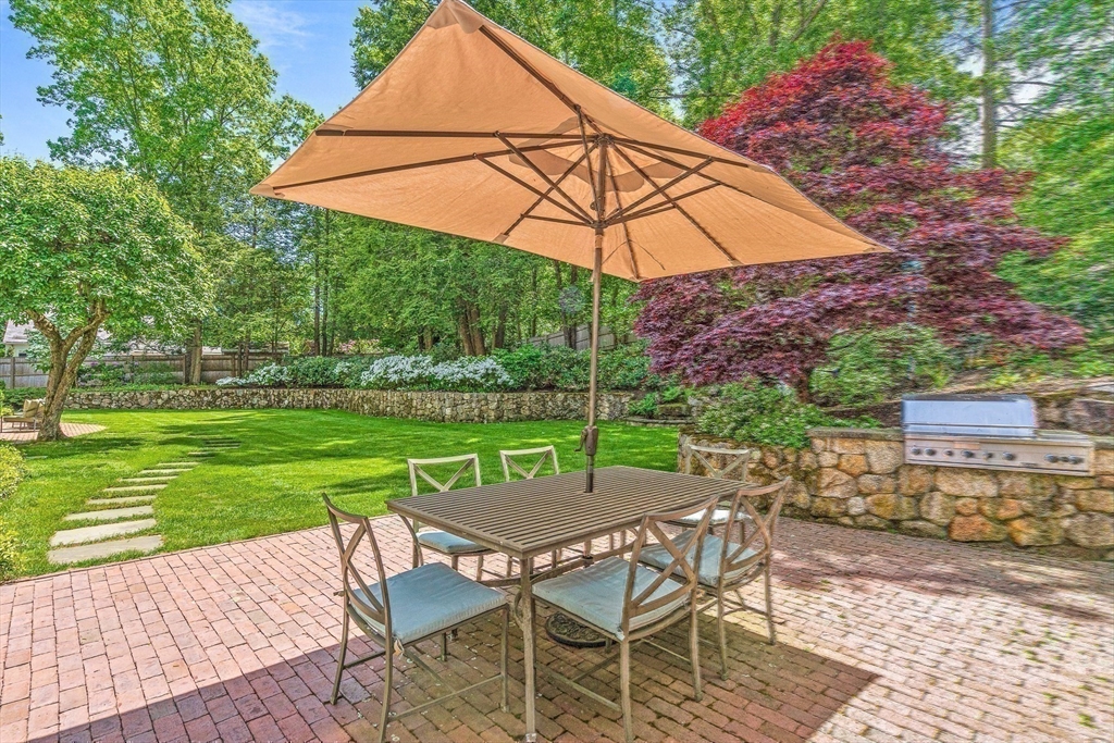 200 Cliff Road Wellesley, MA 02481 - Photo 39 of 41 an outdoor space with furniture and umbrella