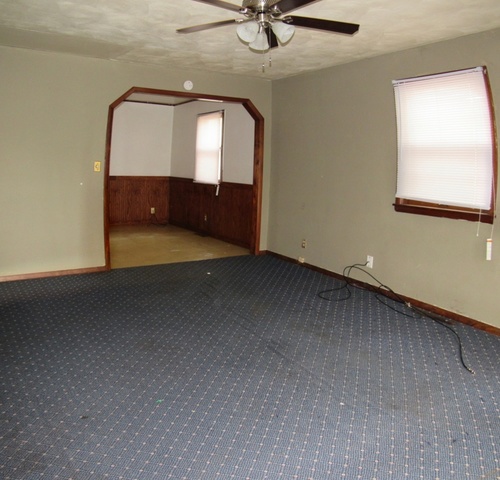 1507 Hedge Road Champaign, IL 61821 - Photo 2 of 8 a view of a livingroom with a staircase