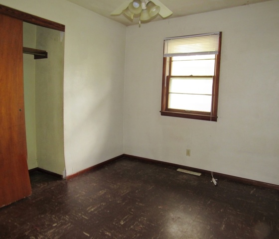1507 Hedge Road Champaign, IL 61821 - Photo 7 of 8 an empty room with a window