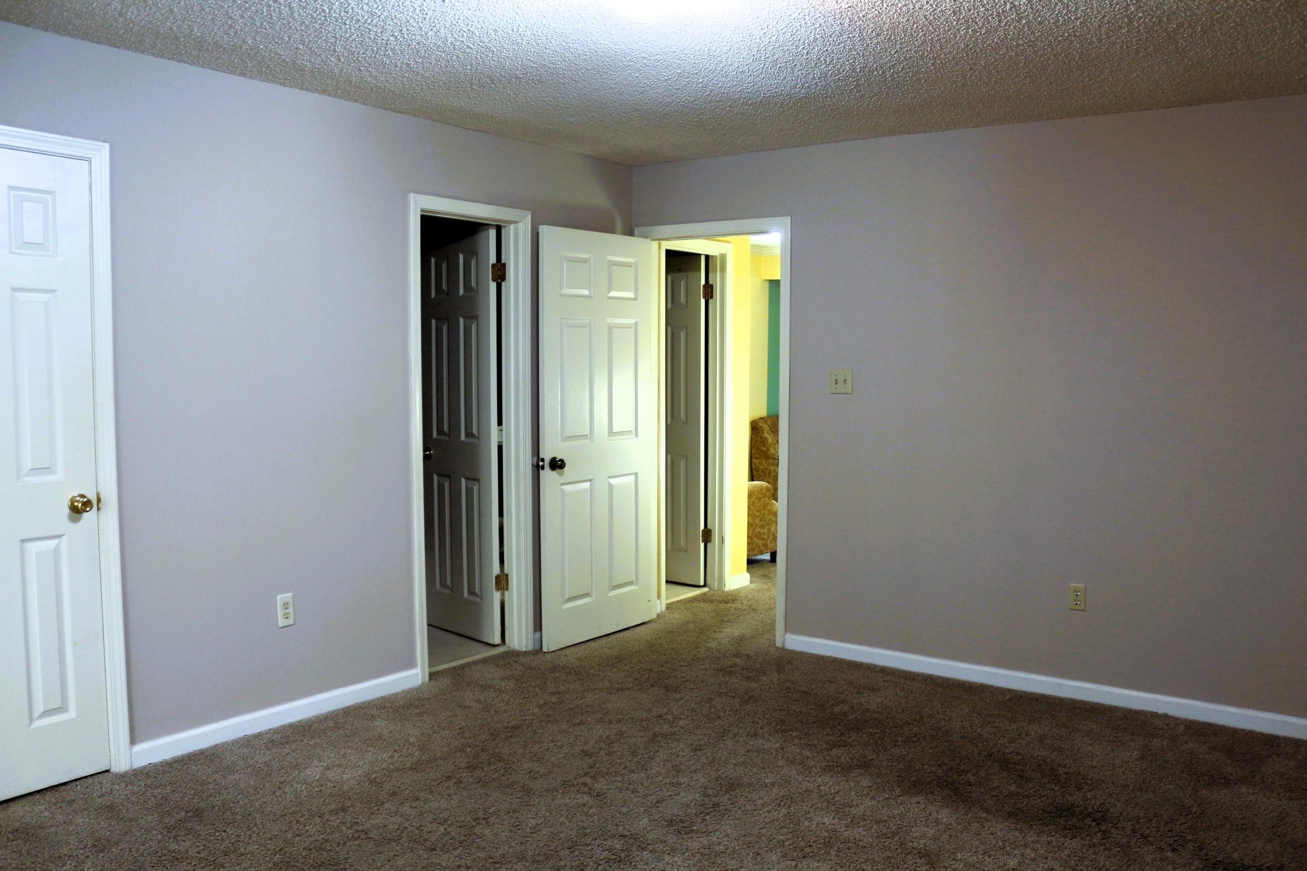 4204 Hickory Grove Road Memphis, TN 38141 - Photo 9 of 15 an empty room with closet and a bathroom
