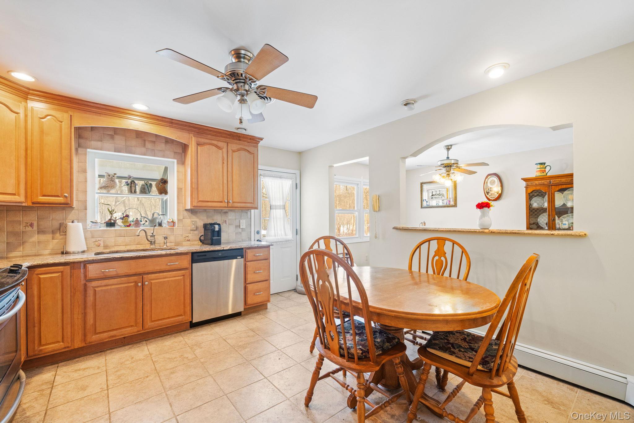38 Haller Crescent Spring Valley, NY 10977 - Photo 7 of 24 Eat in kitchen with door to outside deck