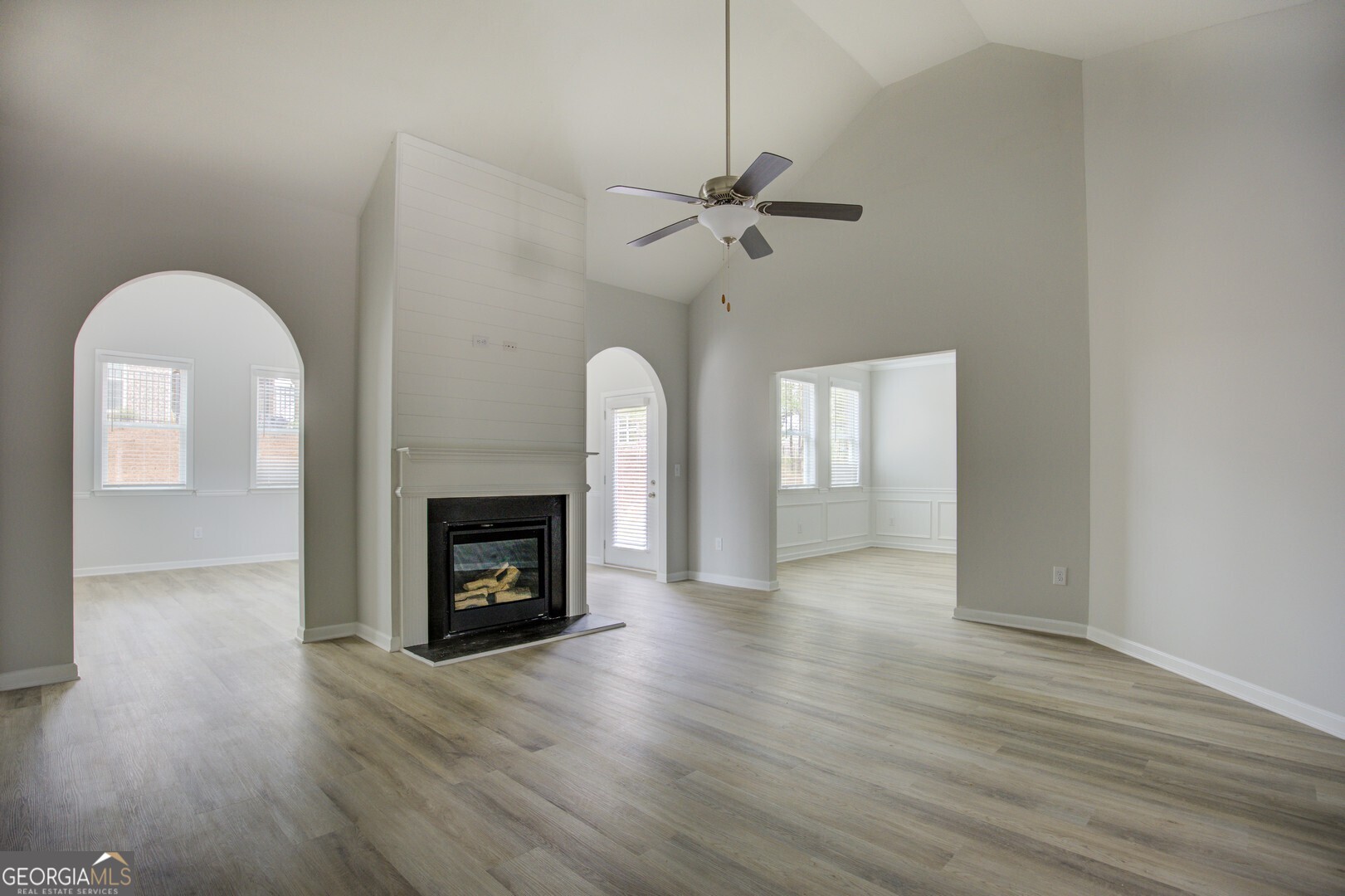 1007 Towne Circle Social Circle, GA 30025 - Photo 11 of 48 a view of an empty room with window and fire place