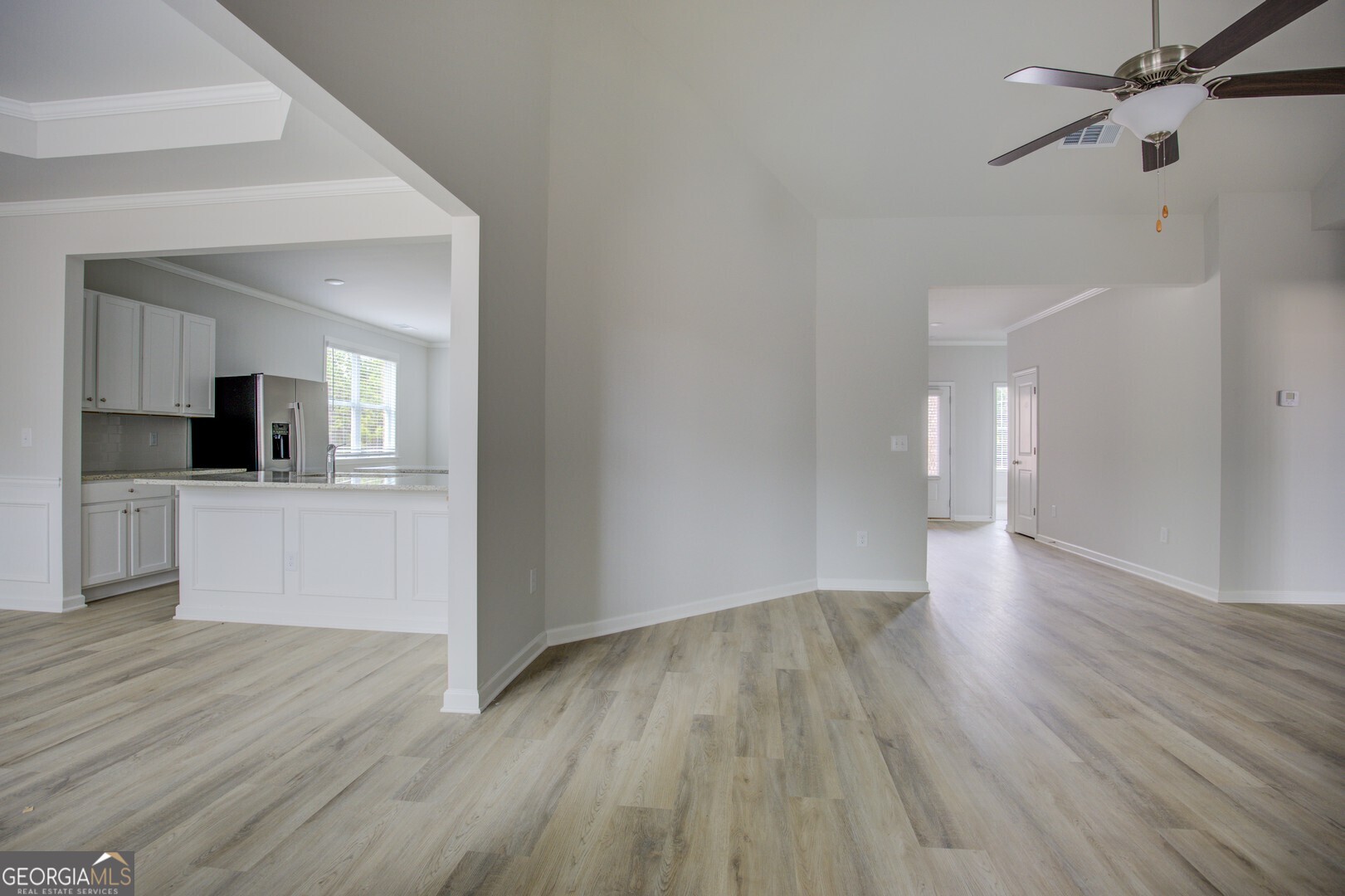1007 Towne Circle Social Circle, GA 30025 - Photo 15 of 48 a view of a kitchen cabinets and wooden floor