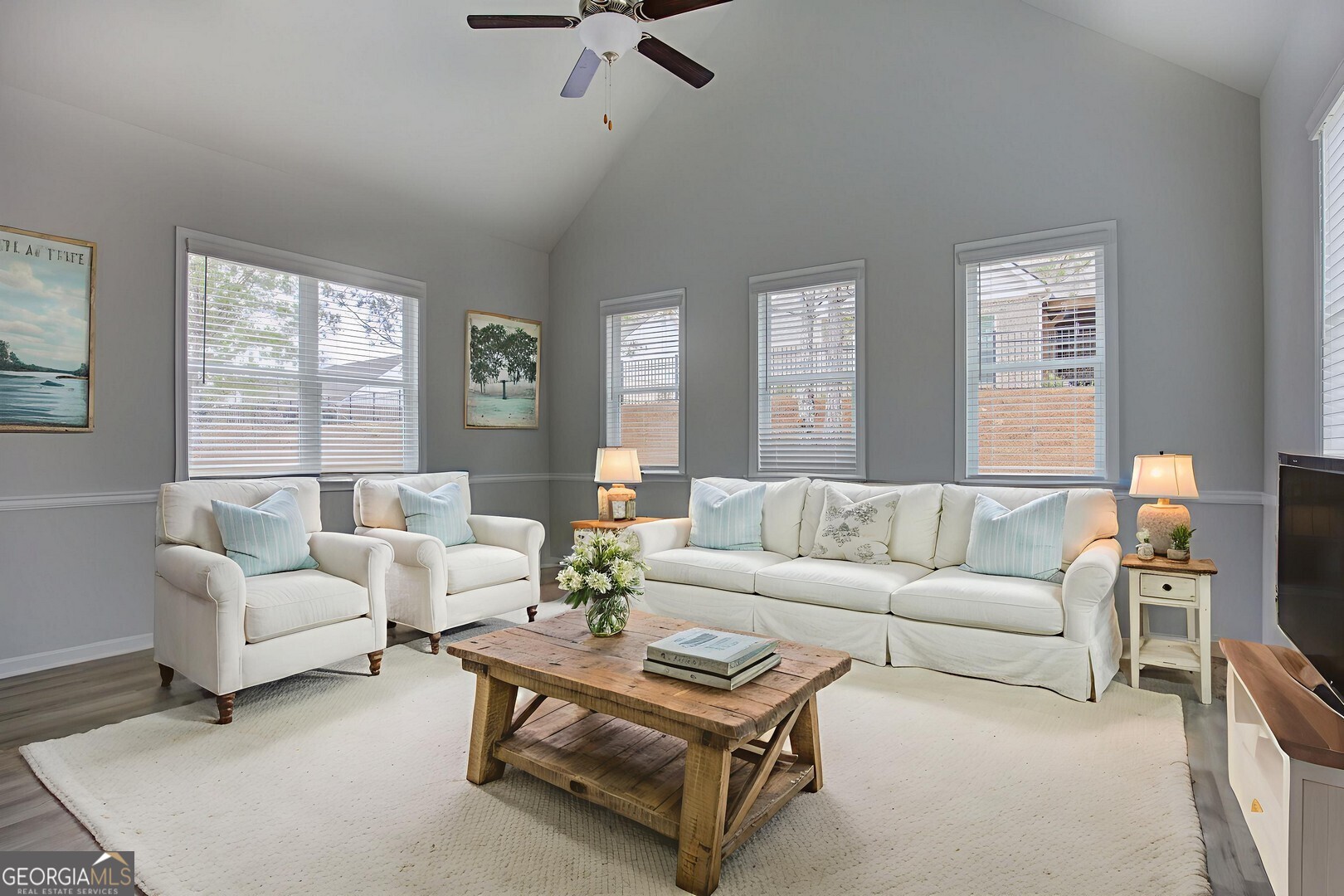 1007 Towne Circle Social Circle, GA 30025 - Photo 16 of 48 a living room with furniture and a large window