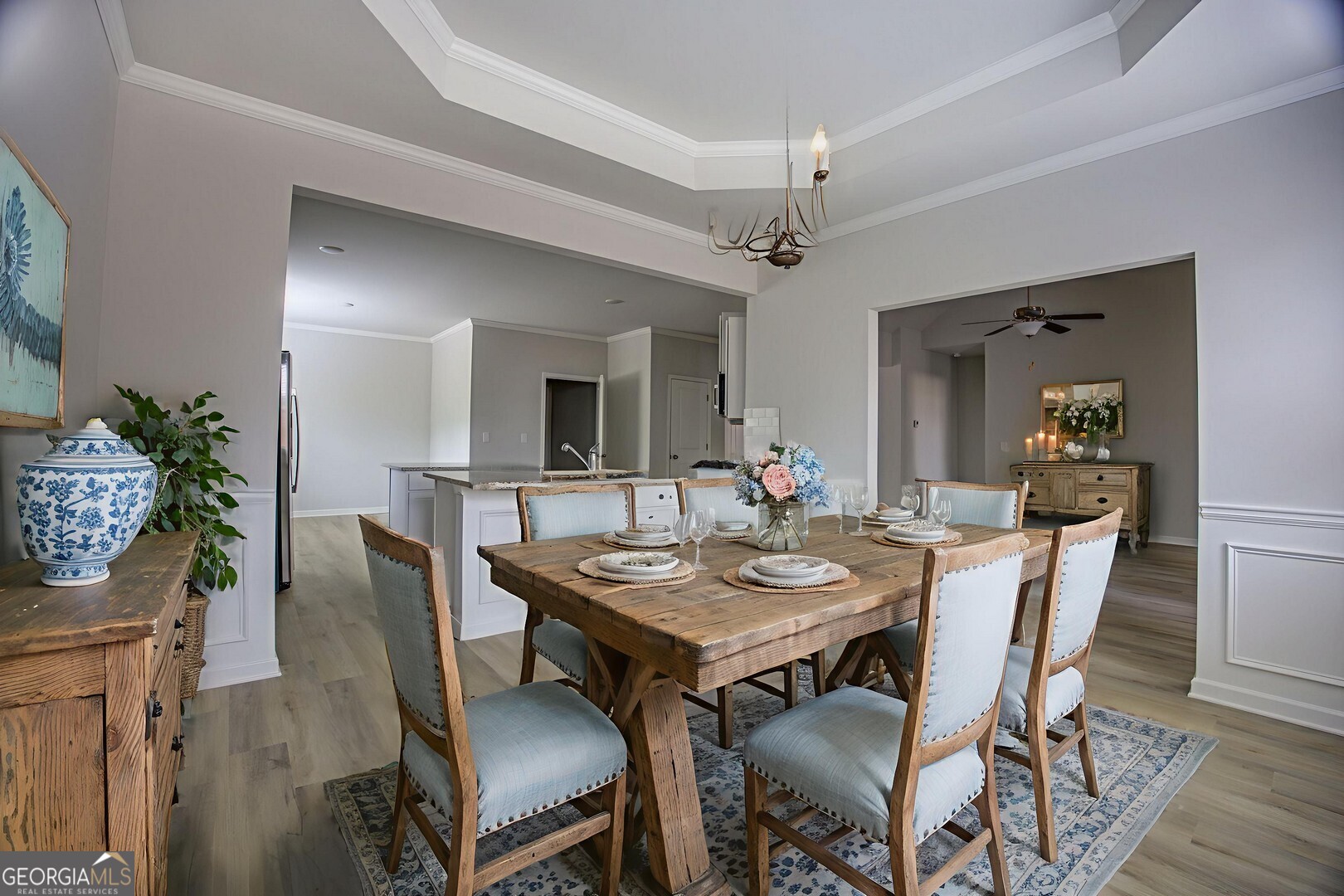 1007 Towne Circle Social Circle, GA 30025 - Photo 20 of 48 a view of a dining room with furniture and wooden floor