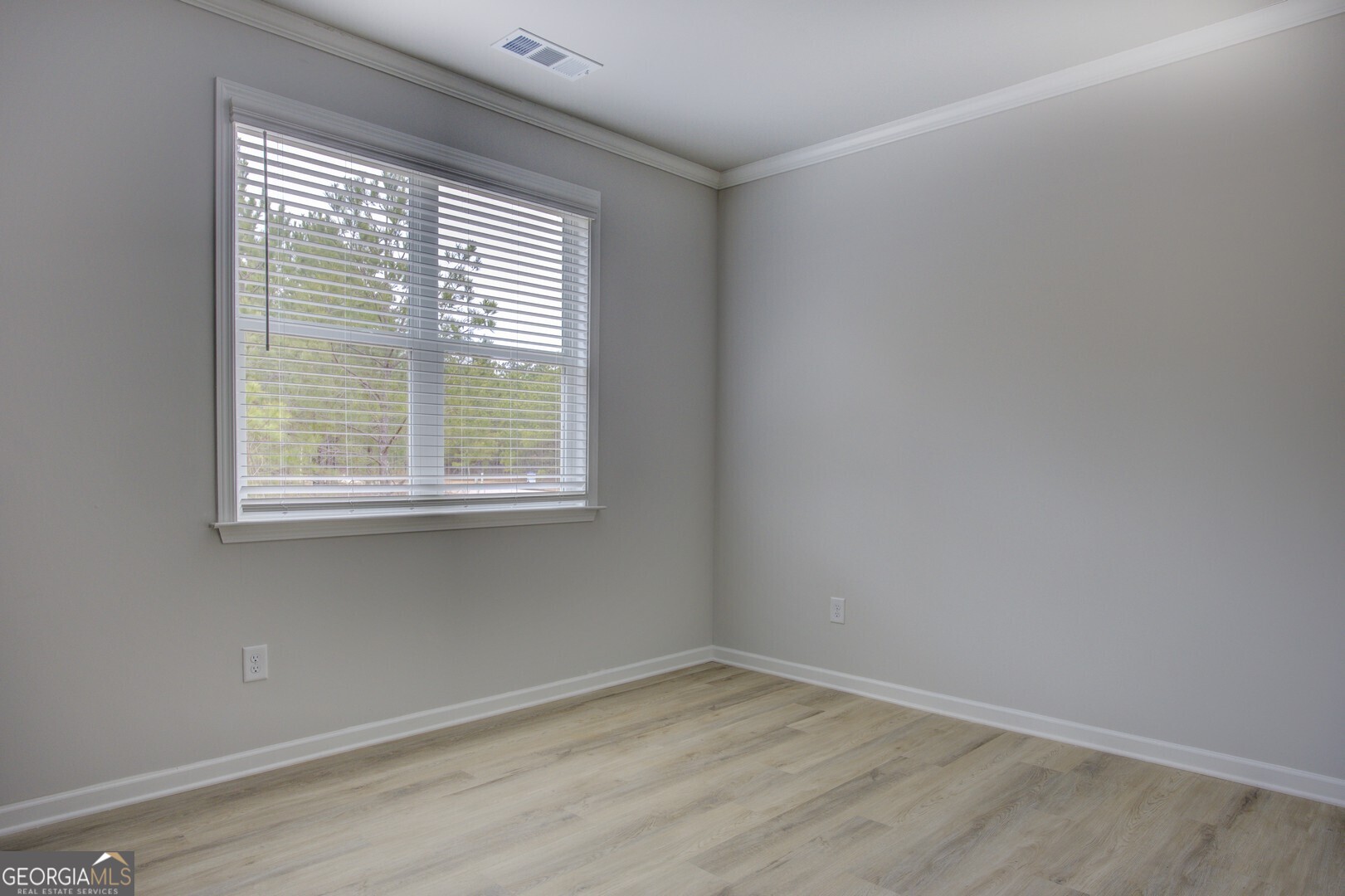 1007 Towne Circle Social Circle, GA 30025 - Photo 29 of 48 an empty room with a window