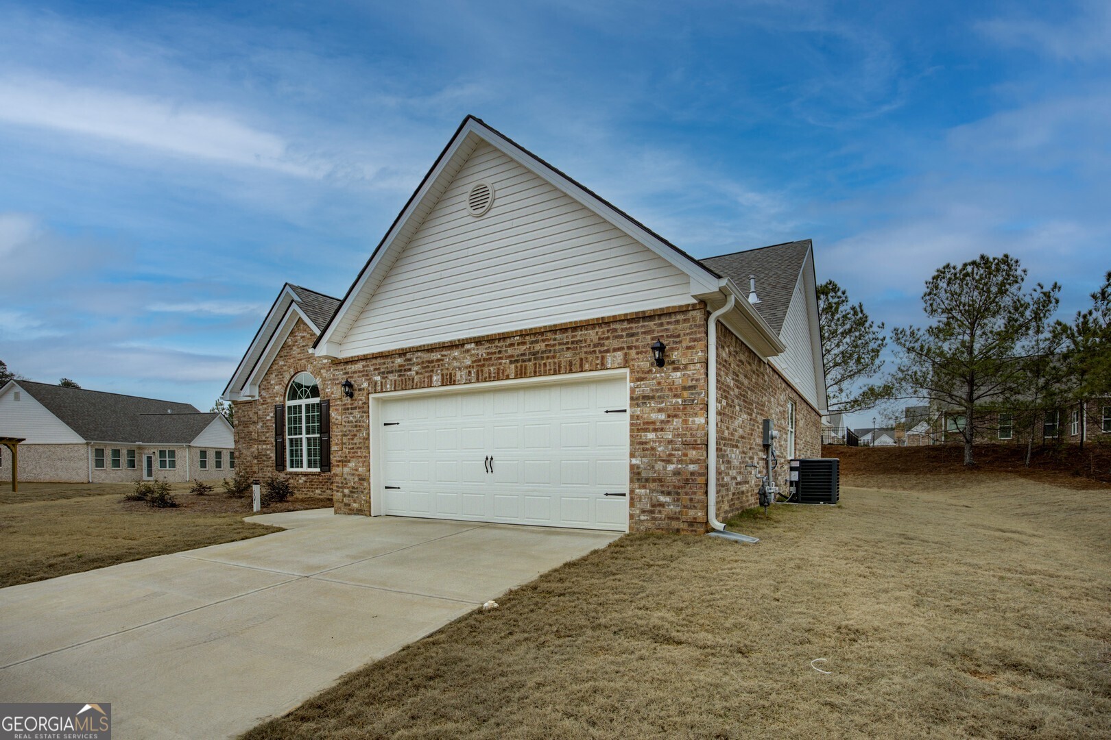 1007 Towne Circle Social Circle, GA 30025 - Photo 3 of 48 a view of a house with a yard