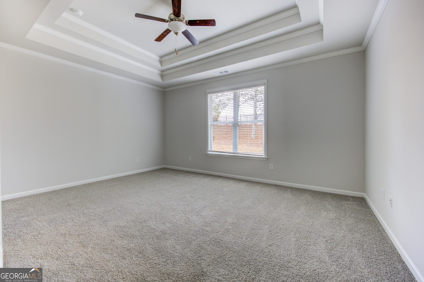 1007 Towne Circle Social Circle, GA 30025 - Photo 33 of 48 an empty room with a window