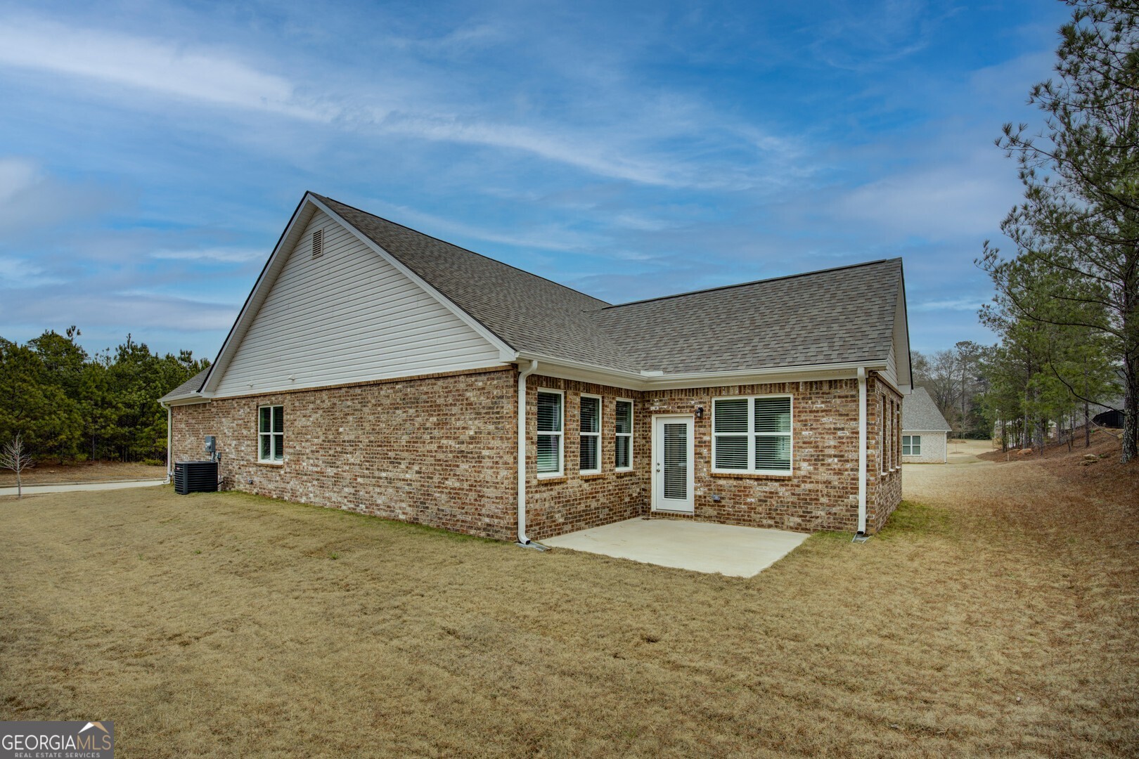 1007 Towne Circle Social Circle, GA 30025 - Photo 4 of 48 front view of a house with a yard