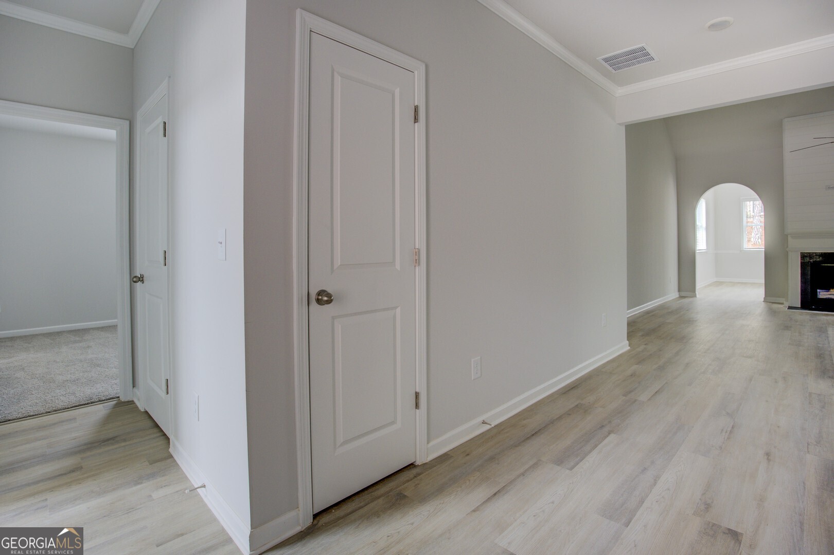 1007 Towne Circle Social Circle, GA 30025 - Photo 46 of 48 a view of a room with wooden floor and a sink