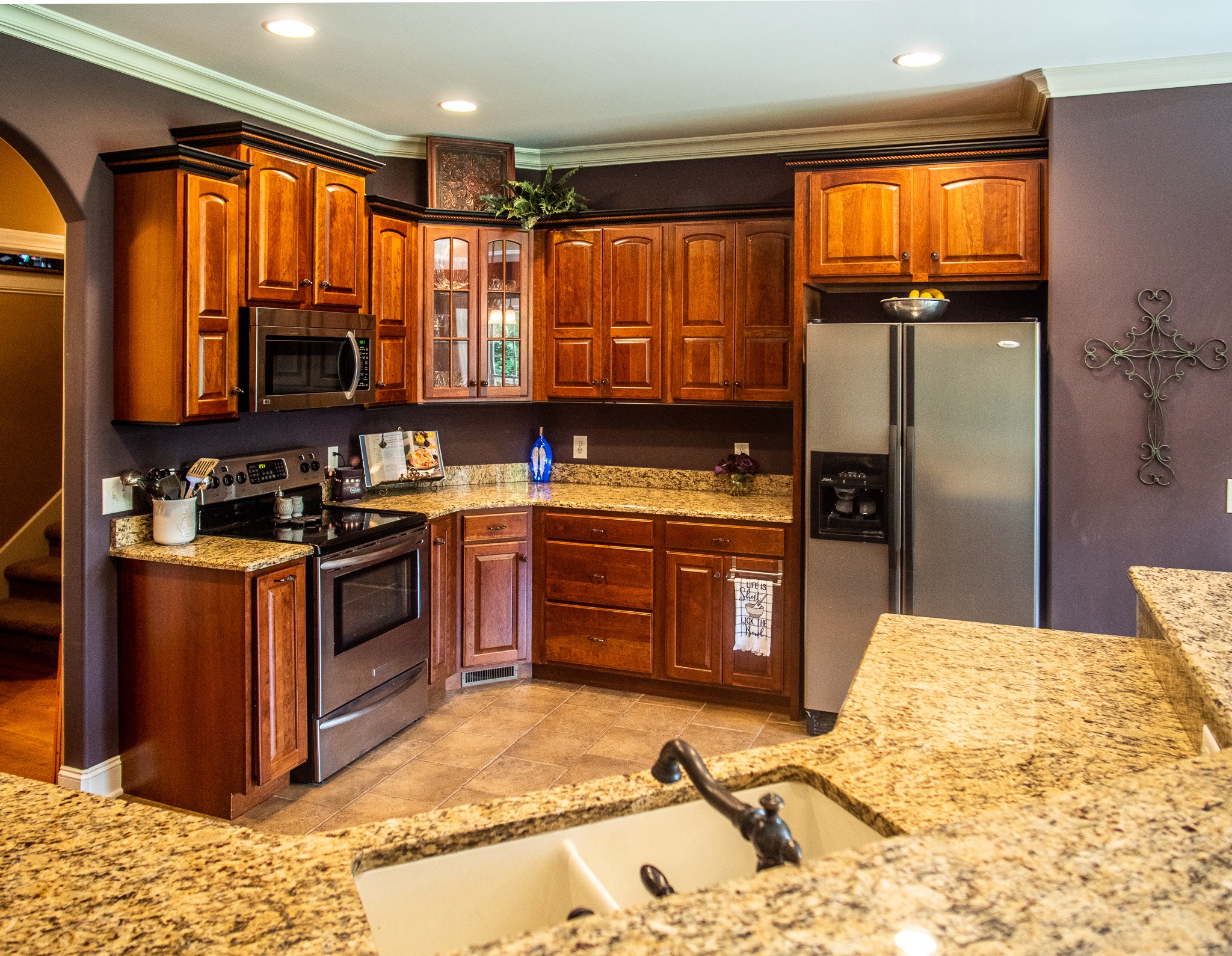 4205 Franklin Road Lebanon, TN 37090 - Photo 11 of 39 a kitchen with stainless steel appliances kitchen island granite countertop a stove a sink and a refrigerator
