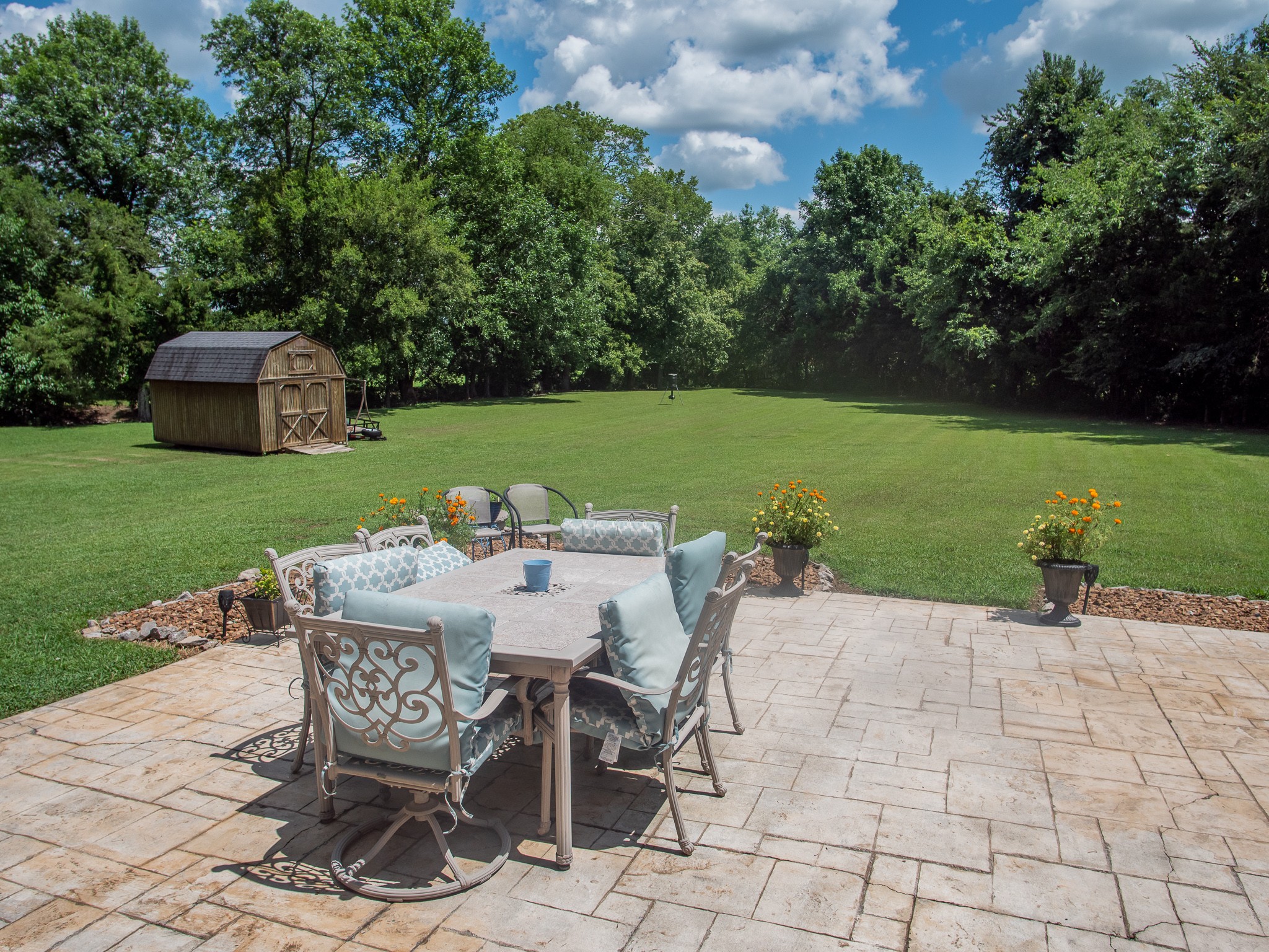 4205 Franklin Road Lebanon, TN 37090 - Photo 30 of 39 a view of a dining table and chairs with the garden