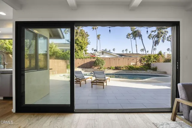 a view of swimming pool with a couch