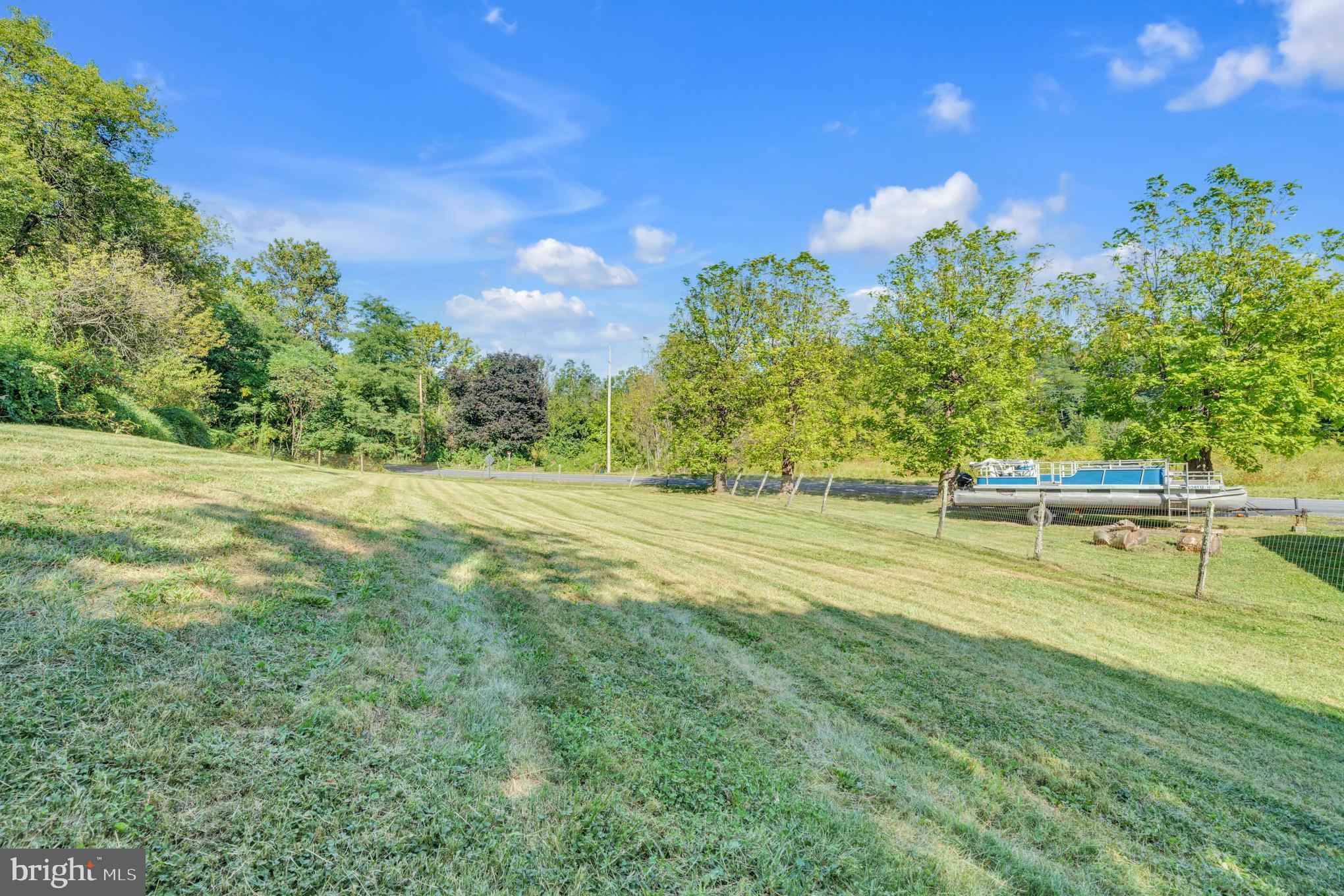 200 Creek Road Gardners, PA 17324 - Photo 24 of 25 a view of yard with swimming pool and trees in the background