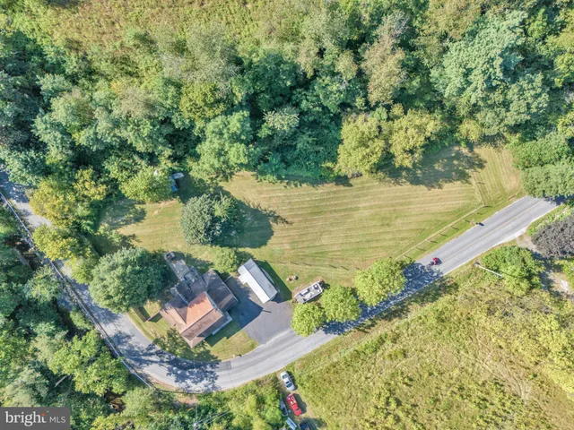 a view of a lake with a yard