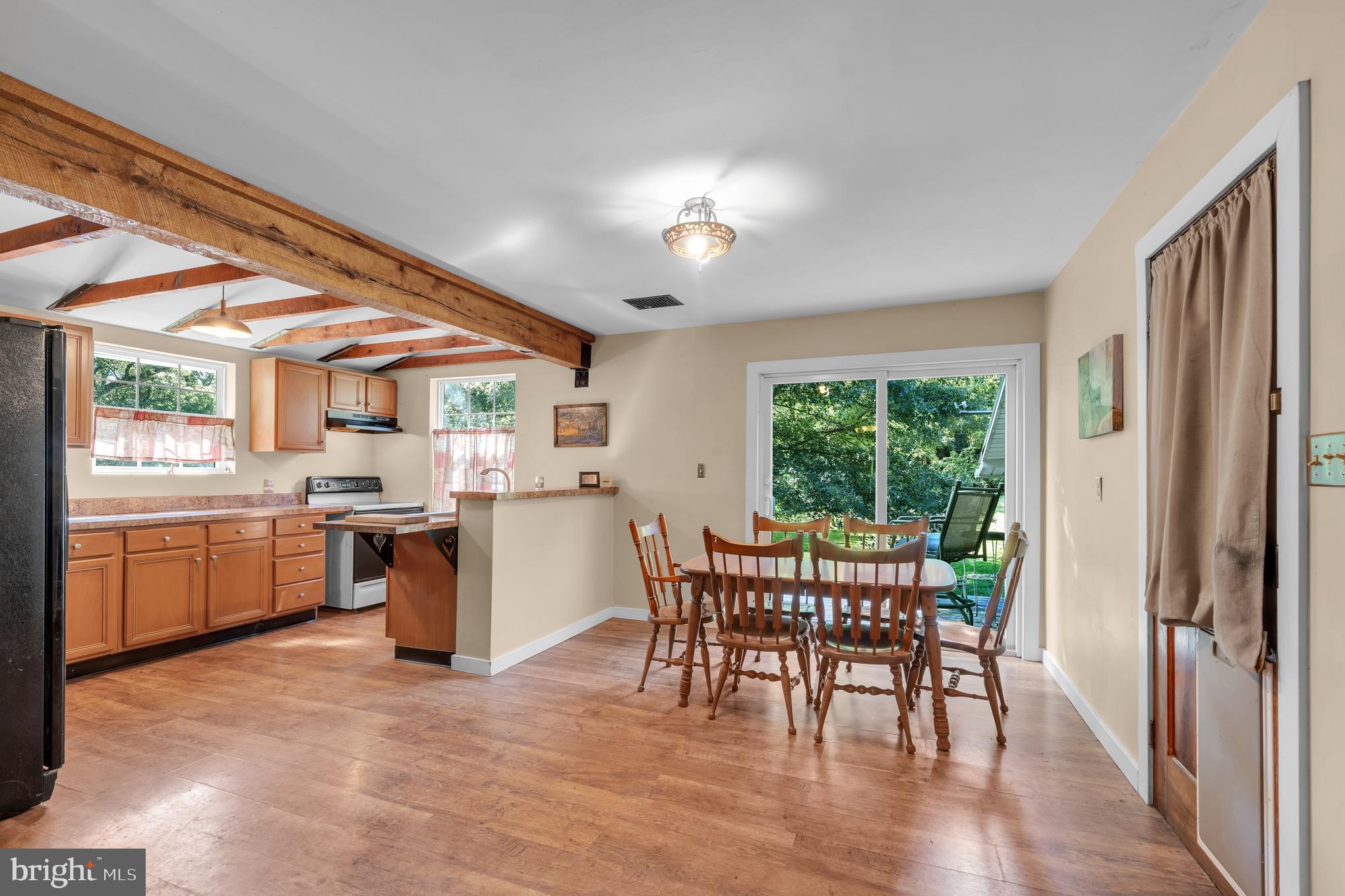 200 Creek Road Gardners, PA 17324 - Photo 6 of 25 a view of a dining room with furniture window and wooden floor