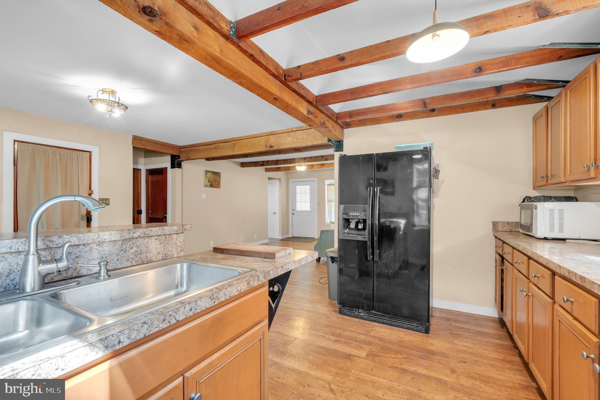 200 Creek Road Gardners, PA 17324 - Photo 7 of 25 a kitchen with stainless steel appliances granite countertop a sink and cabinets