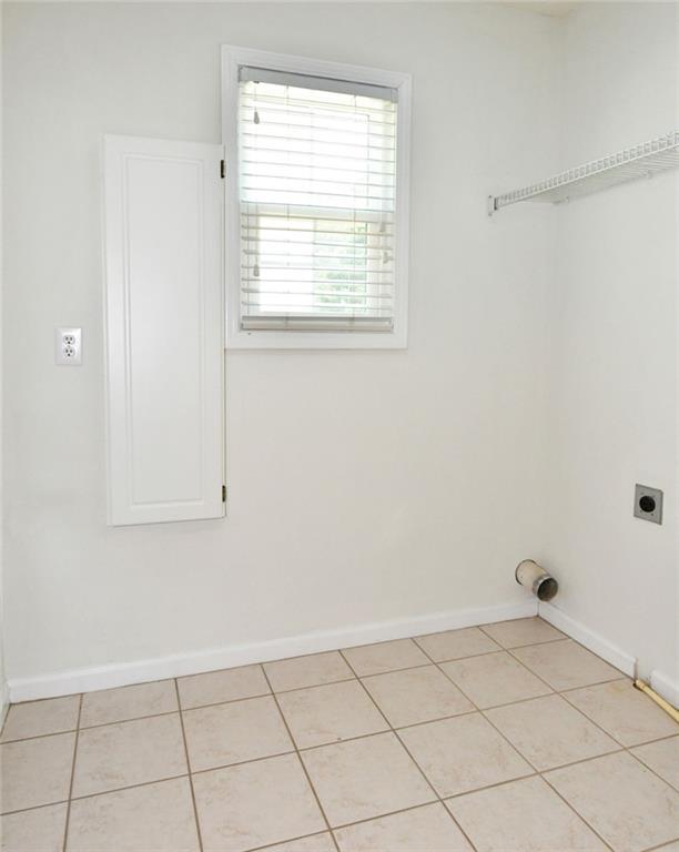 795 Sunset Ridge Lane Southeast Lawrenceville, GA 30045 - Photo 30 of 57 a view of an empty room and window