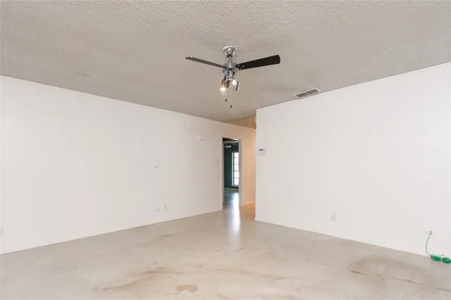 a view of a ceiling fan in a room