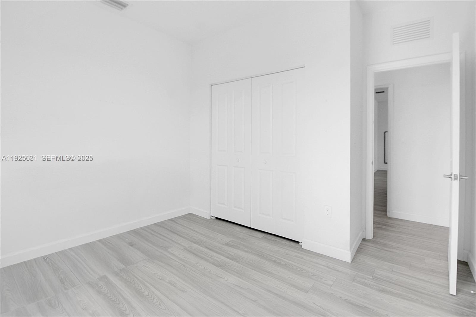 879 Southeast 26th Terrace Homestead, FL 33035 - Photo 33 of 43 a view of an empty room