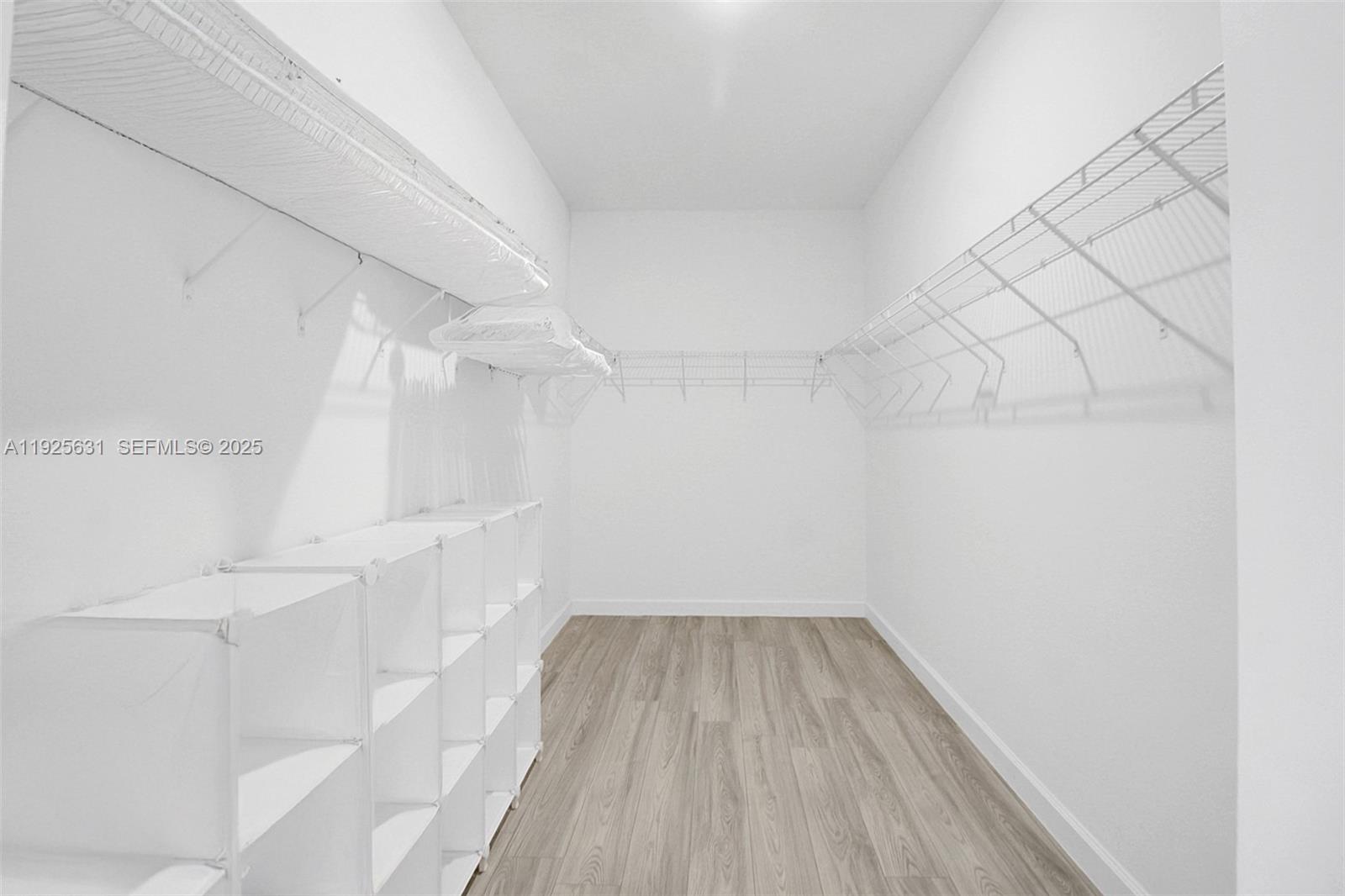 879 Southeast 26th Terrace Homestead, FL 33035 - Photo 42 of 43 a view of a room with wooden floor