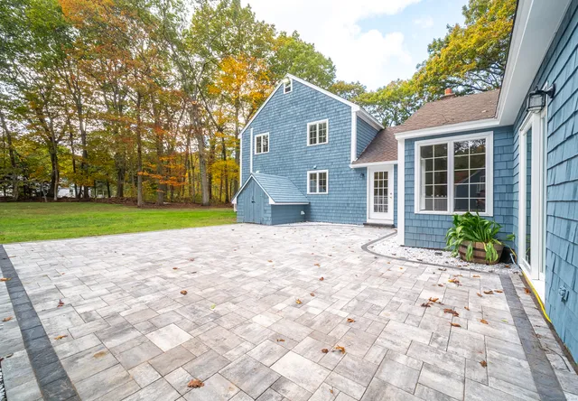 a house with trees in front of it