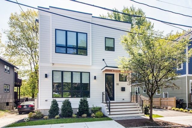 a bathroom with a bathtub and a sink