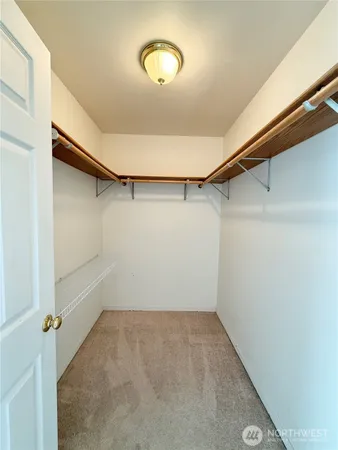 a bathroom with a shower and a bath tub