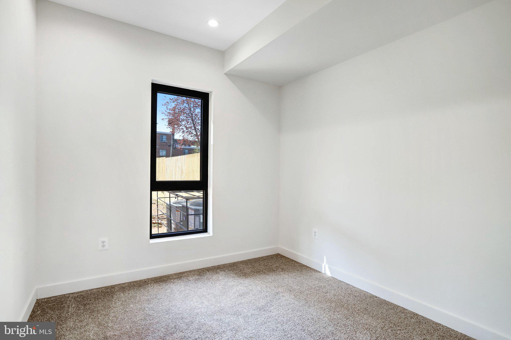 5221 F Street Southeast Washington, DC 20019 - Photo 22 of 63 an empty room with windows