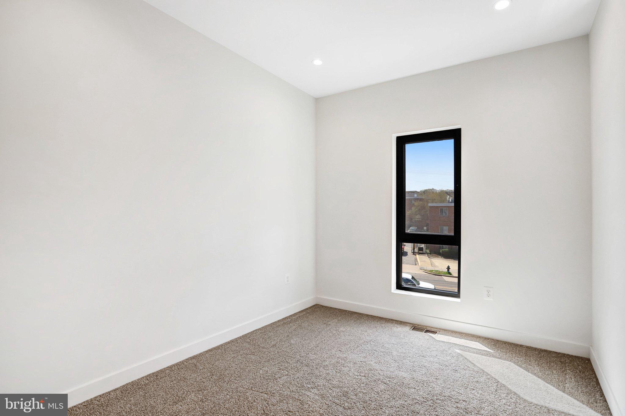 5221 F Street Southeast Washington, DC 20019 - Photo 48 of 63 an empty room with windows
