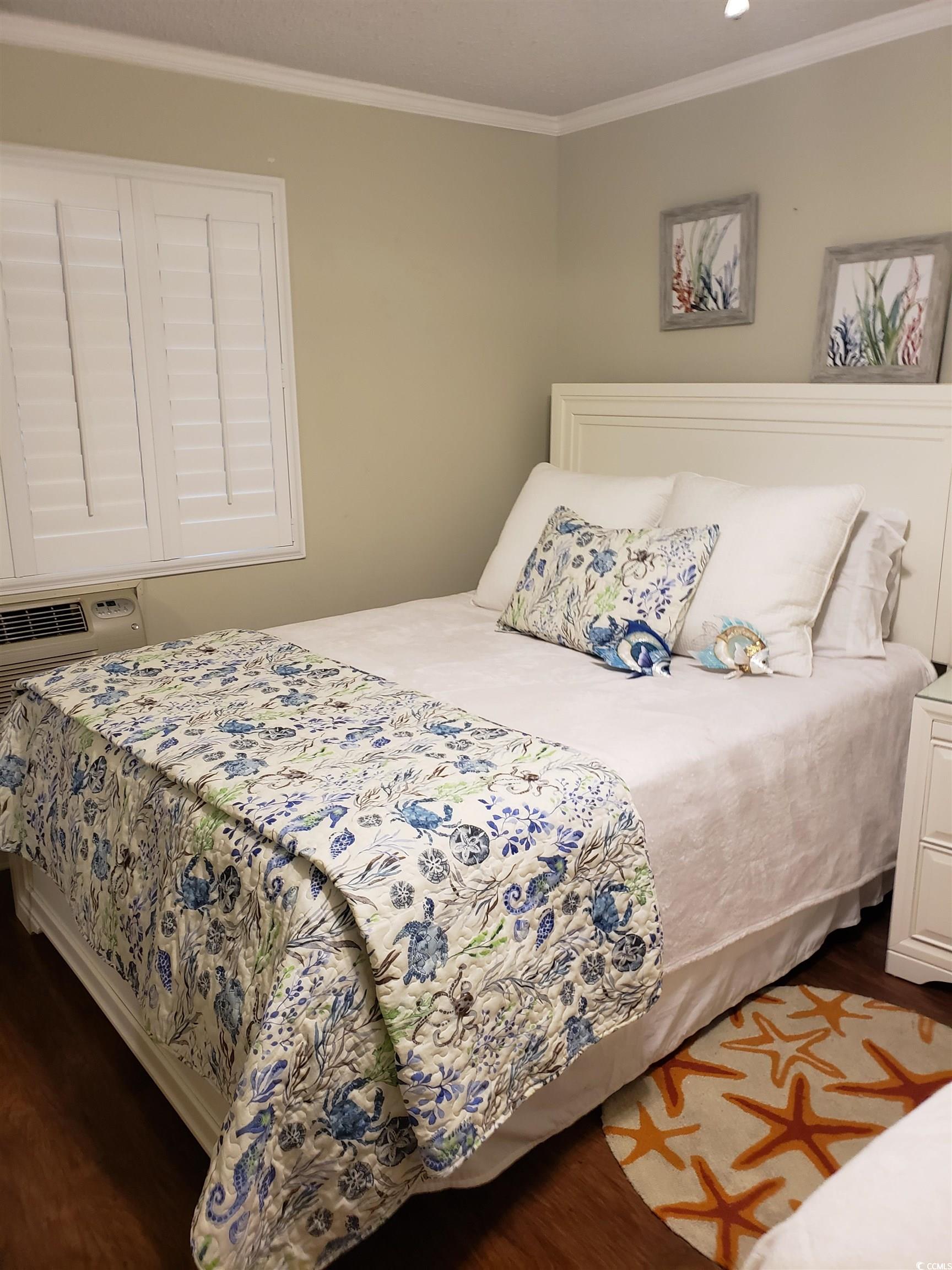 1919 Spring Street, Unit B11 North Myrtle Beach, SC 29582 - Photo 11 of 32 Bedroom featuring dark hardwood / wood-style floor