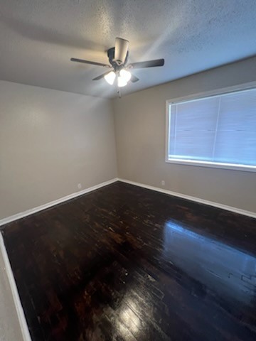 9306 St Lo Road Houston, TX 77033 - Photo 7 of 13 Bedroom with hardwood floorings and new ceiling fan