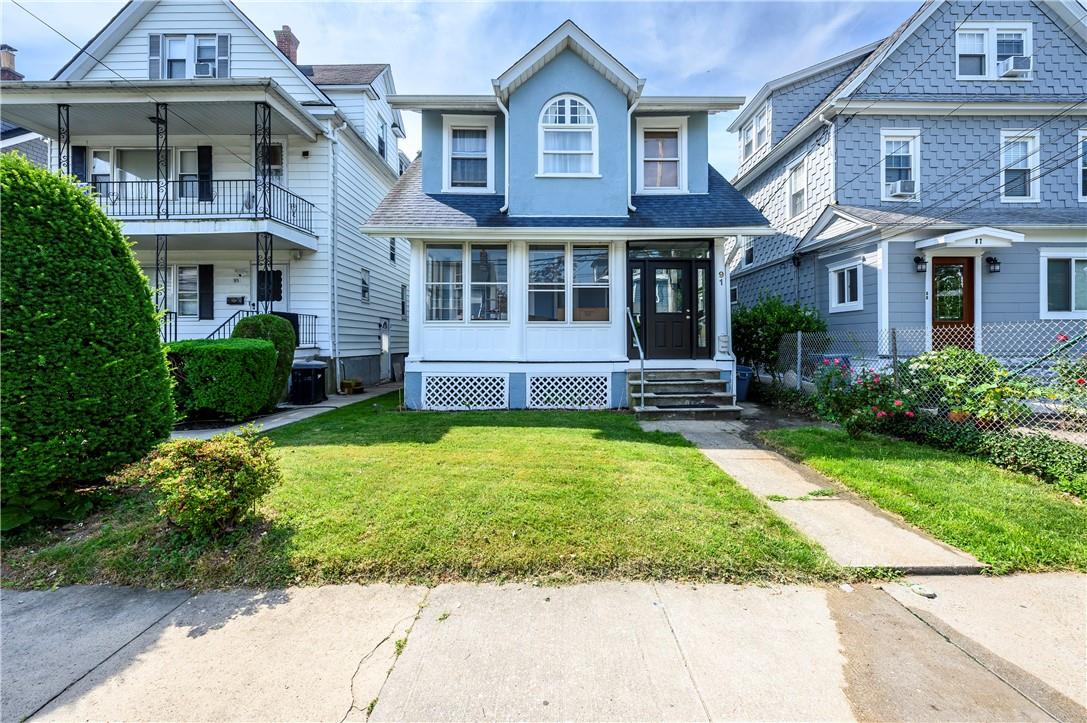 91 Brookside Place New Rochelle, NY 10801 - Photo 1 of 1 View of front of home with a front yard