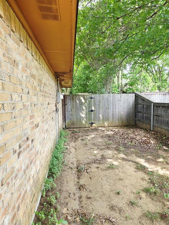 722 South Church Street Pilot Point, TX 76258 - Photo 30 of 37 a view of small backyard with small cabin