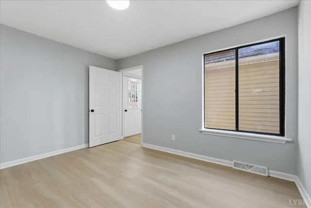 a kitchen with stainless steel appliances a stove and cabinets