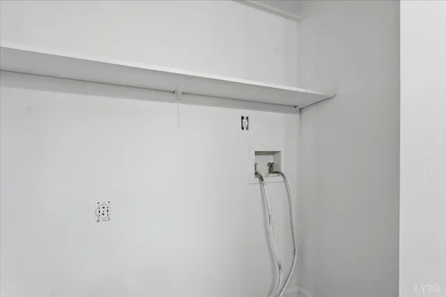 a view of a house with backyard and deck