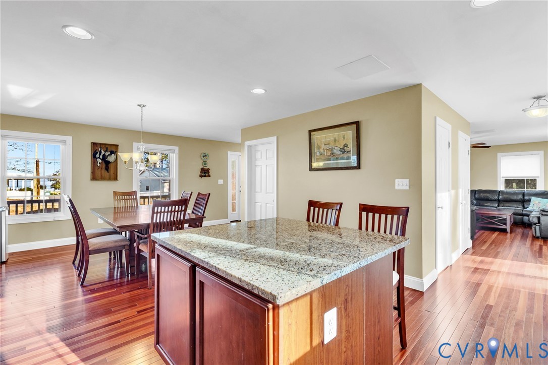 275 Granny's Bar Road Hague, VA 22469 - Photo 20 of 53 a view of a dining room with furniture and wooden floor