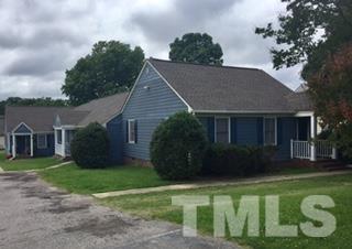 4541 Hargrove Road, Unit AD Raleigh, NC 27604 - Photo 1 of 22 a front view of a house with a garden