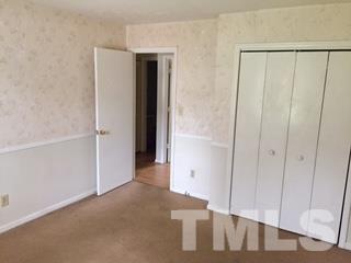 4541 Hargrove Road, Unit AD Raleigh, NC 27604 - Photo 12 of 22 a view of a hallway with closet area