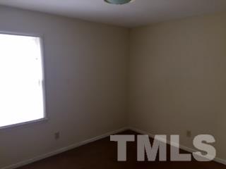4541 Hargrove Road, Unit AD Raleigh, NC 27604 - Photo 13 of 22 a wooden door with a window