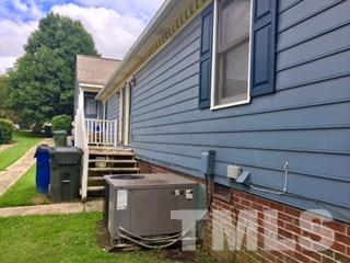 4541 Hargrove Road, Unit AD Raleigh, NC 27604 - Photo 19 of 22 a view of a backyard with sitting area