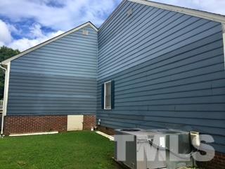 4541 Hargrove Road, Unit AD Raleigh, NC 27604 - Photo 20 of 22 a backyard of a house with lots of green space