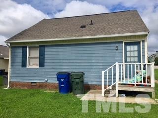 4541 Hargrove Road, Unit AD Raleigh, NC 27604 - Photo 21 of 22 a view of house with backyard porch and outdoor seating